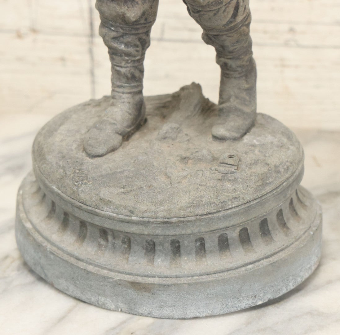 Lot 035 - Antique Spelter Metal Soldier Statue, Wearing Armor And Helmet, Note Missing Arm, Damaged / Warped Based, Overall Poor Condition, 16-1/2" Height