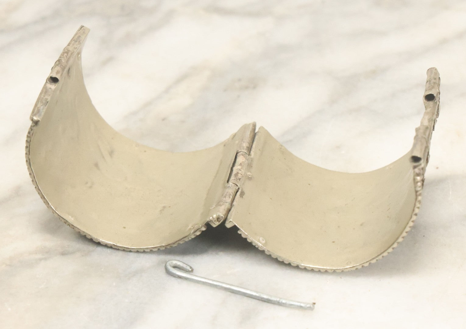 Lot 038 - Pair Of Ornate Middle Eastern Metal Cuff Bracelets, One With Red Beads