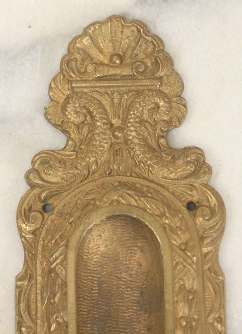Lot 039 - Vintage Solid Brass Pocket Door Pull With Dolphin Motif, Ornate Design