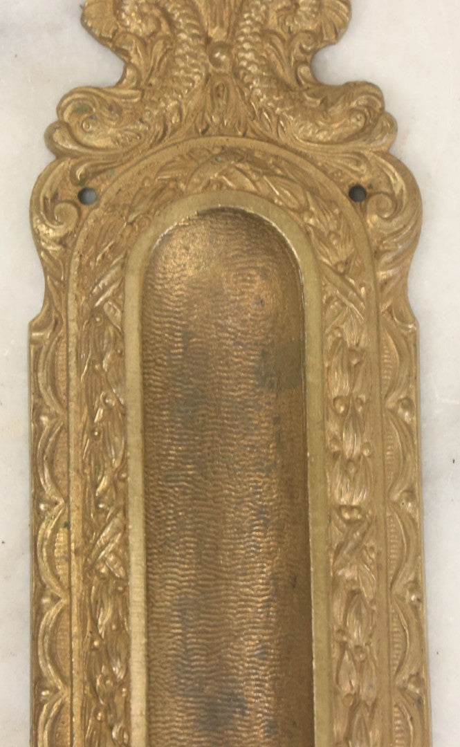 Lot 039 - Vintage Solid Brass Pocket Door Pull With Dolphin Motif, Ornate Design