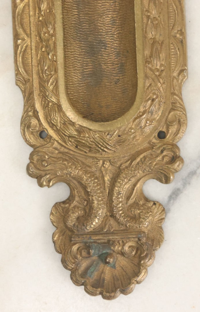 Lot 039 - Vintage Solid Brass Pocket Door Pull With Dolphin Motif, Ornate Design