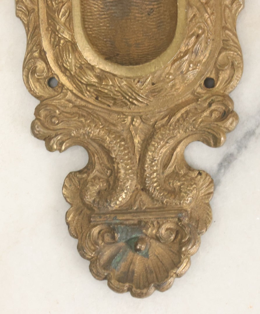 Lot 039 - Vintage Solid Brass Pocket Door Pull With Dolphin Motif, Ornate Design