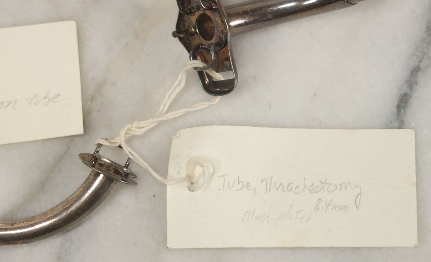 Lot 049 - Grouping Of Three Vintage Tracheotomy Medical Devices, With Paper Identification Tags