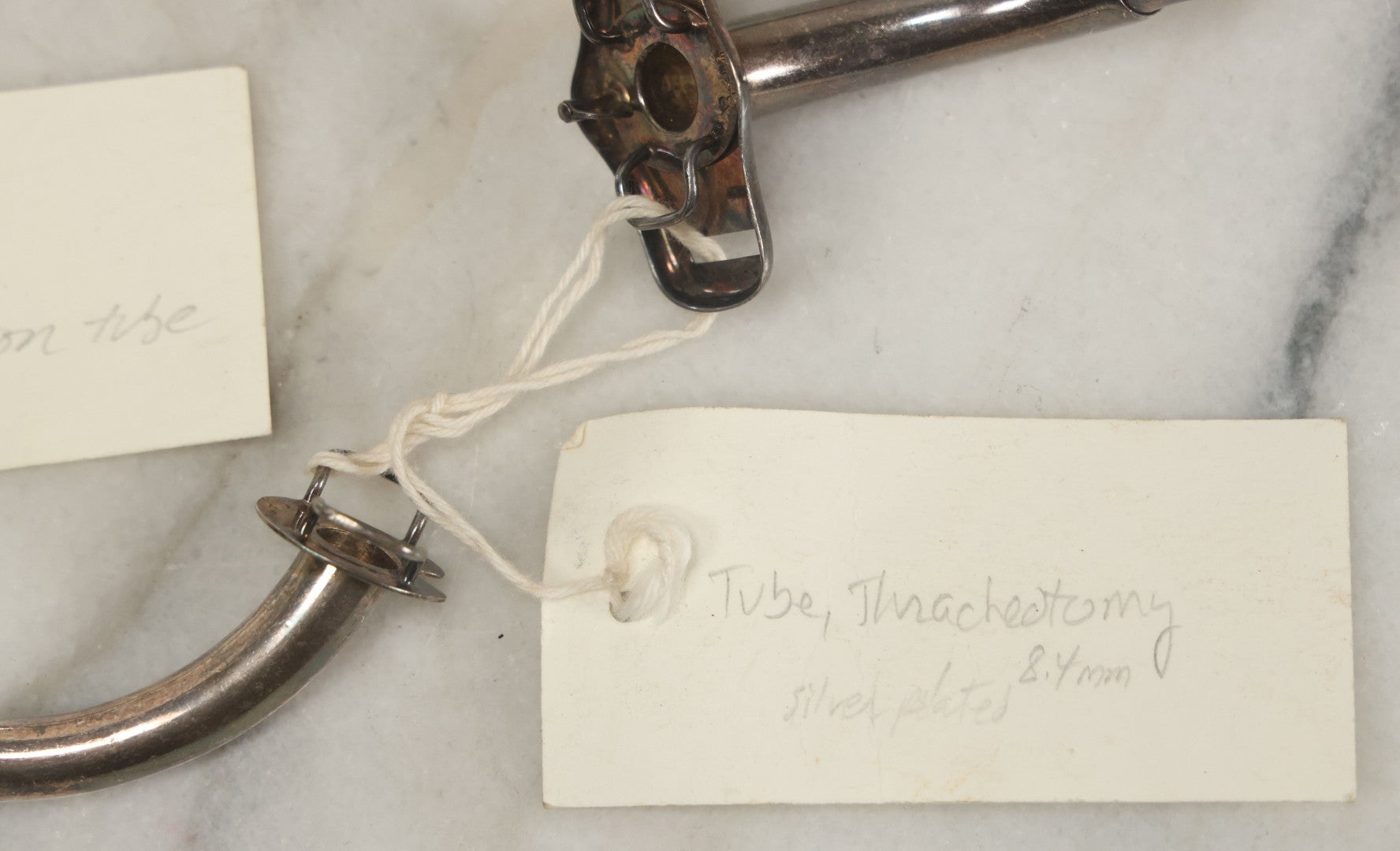 Lot 049 - Grouping Of Three Vintage Tracheotomy Medical Devices, With Paper Identification Tags