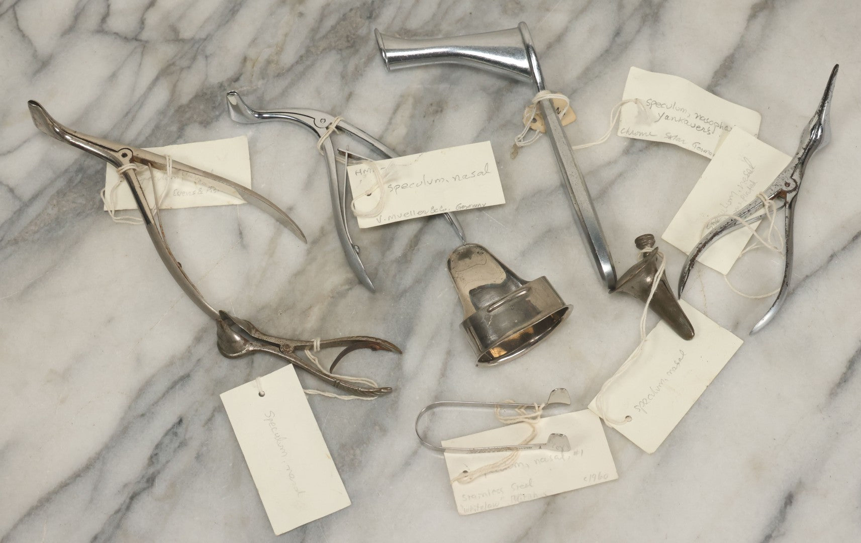 Lot 050 - Grouping Of Eight Vintage Nasal Speculums Medical Devices, With Paper Identification Tags