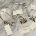 Lot 050 - Grouping Of Eight Vintage Nasal Speculums Medical Devices, With Paper Identification Tags