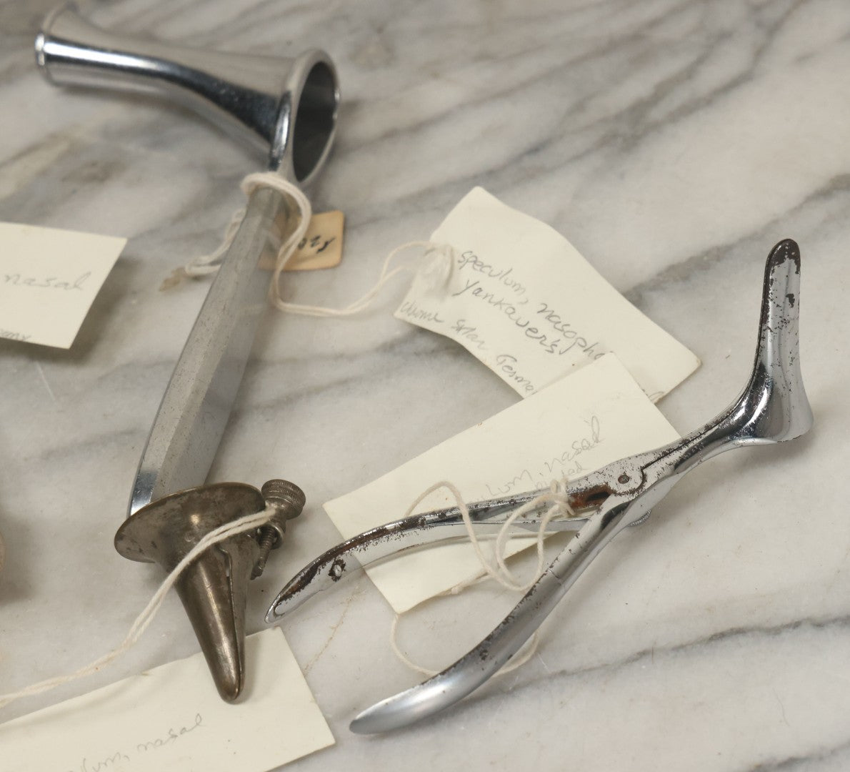 Lot 050 - Grouping Of Eight Vintage Nasal Speculums Medical Devices, With Paper Identification Tags
