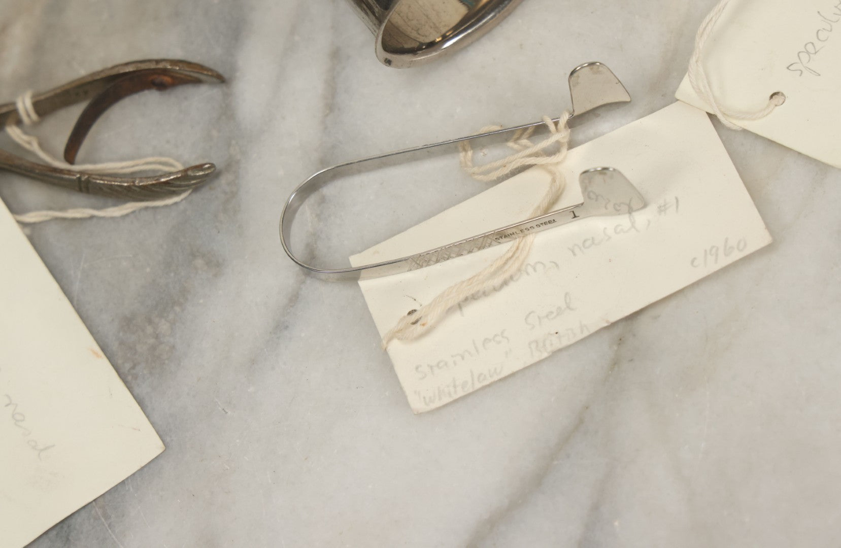 Lot 050 - Grouping Of Eight Vintage Nasal Speculums Medical Devices, With Paper Identification Tags
