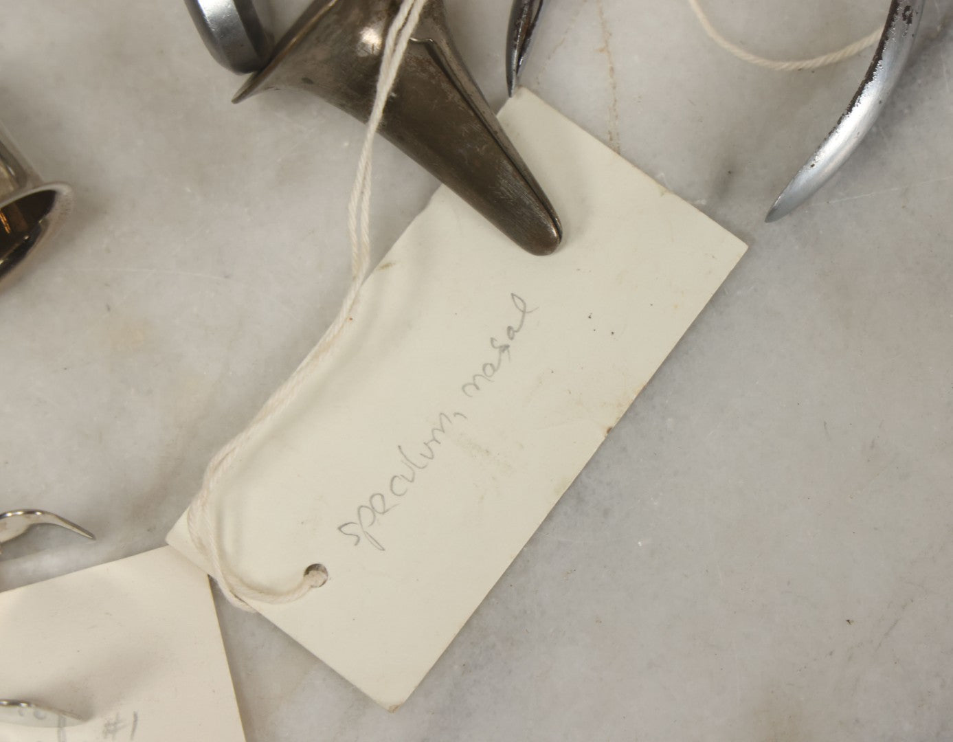 Lot 050 - Grouping Of Eight Vintage Nasal Speculums Medical Devices, With Paper Identification Tags