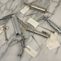 Lot 051 - Grouping Of Ten Vintage Medical Devices, Including Spection Devices, Irrigation Syringe, Etc., With Paper Identification Tags