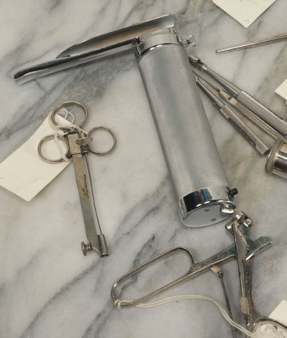 Lot 051 - Grouping Of Ten Vintage Medical Devices, Including Spection Devices, Irrigation Syringe, Etc., With Paper Identification Tags