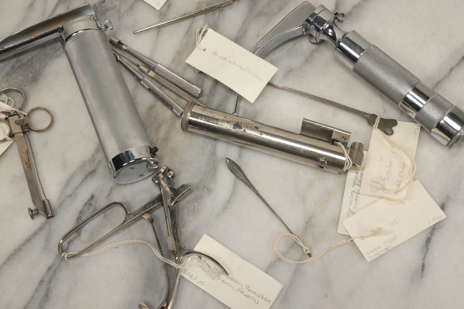 Lot 051 - Grouping Of Ten Vintage Medical Devices, Including Spection Devices, Irrigation Syringe, Etc., With Paper Identification Tags