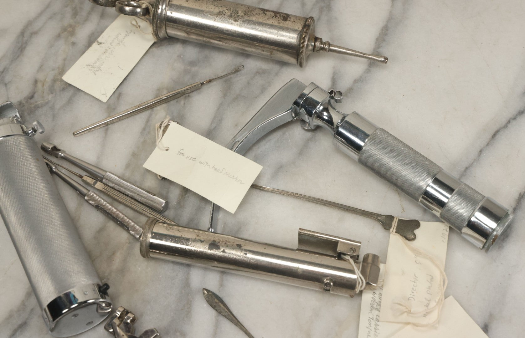 Lot 051 - Grouping Of Ten Vintage Medical Devices, Including Spection Devices, Irrigation Syringe, Etc., With Paper Identification Tags