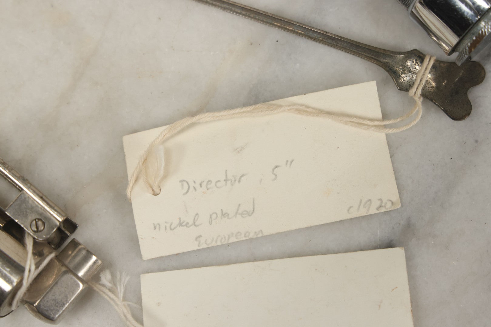 Lot 051 - Grouping Of Ten Vintage Medical Devices, Including Spection Devices, Irrigation Syringe, Etc., With Paper Identification Tags