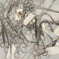 Lot 052 - Grouping Of 25+ Vintage Medical Forceps Devices, Scissors, Etc., Many With Paper Identification Tags