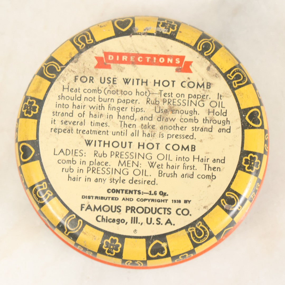 Lot 075 - Vintage Lucky Brown Pressing Oil Hair Product Tin, Distributed By Famous Products Co., Chicago