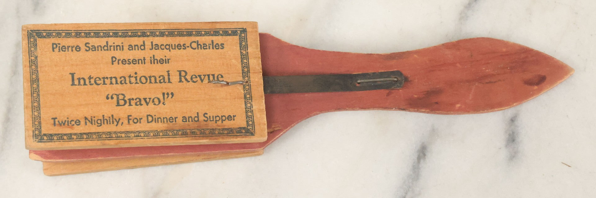 Lot 079 - Antique International Casino, New York City Clapper Noise Maker Novelty, "Pierre Sandrini & Jacques-Charles Present Their International Revue 'Bravo!'"