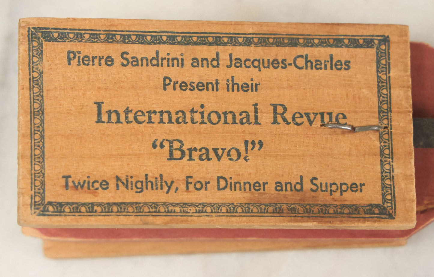 Lot 079 - Antique International Casino, New York City Clapper Noise Maker Novelty, "Pierre Sandrini & Jacques-Charles Present Their International Revue 'Bravo!'"