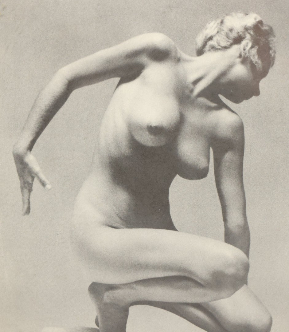 Lot 090 - Vintage Artistic Nude Photograph Magazine Clipping Of A Woman Posing On Rocks, After Andres De Dienes, 8-3/4" x 11-1/8"