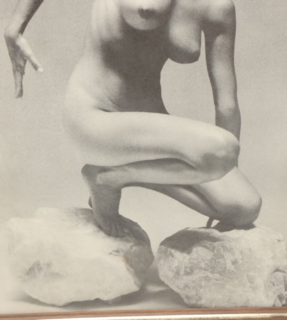 Lot 090 - Vintage Artistic Nude Photograph Magazine Clipping Of A Woman Posing On Rocks, After Andres De Dienes, 8-3/4" x 11-1/8"