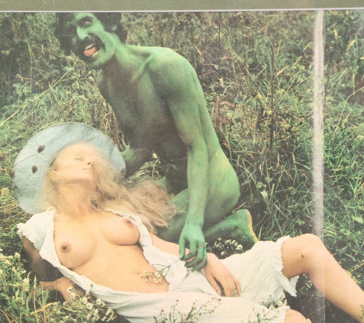 Lot 091 - Vintage Bizarre Nude Photograph With Man In Green Paint, Nude Woman, Magazine Clipping In Modern Frame, 14-1/4" x 11-1/4"