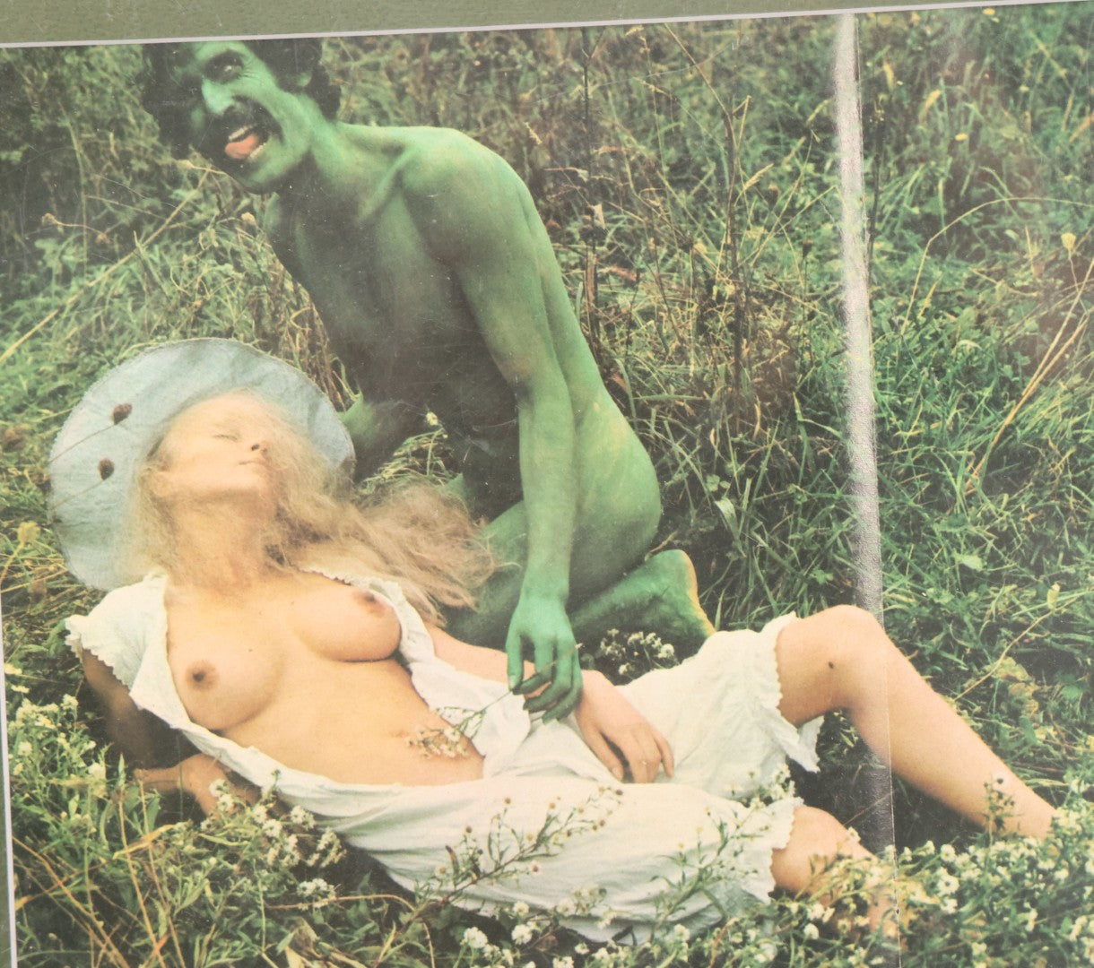 Lot 091 - Vintage Bizarre Nude Photograph With Man In Green Paint, Nude Woman, Magazine Clipping In Modern Frame, 14-1/4" x 11-1/4"