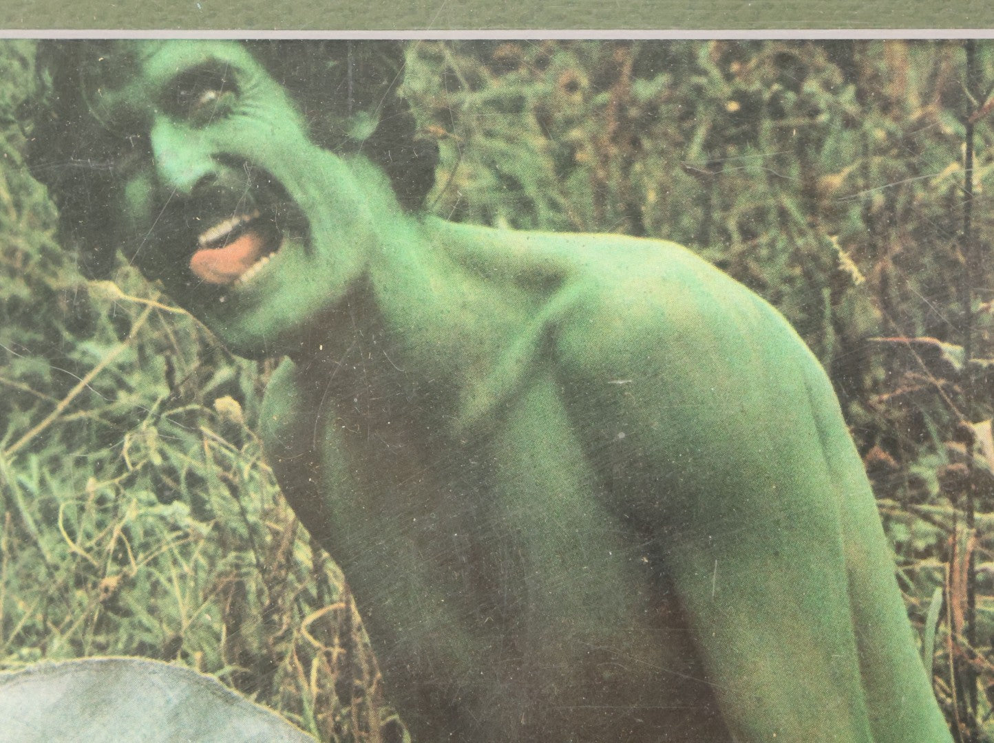 Lot 091 - Vintage Bizarre Nude Photograph With Man In Green Paint, Nude Woman, Magazine Clipping In Modern Frame, 14-1/4" x 11-1/4"