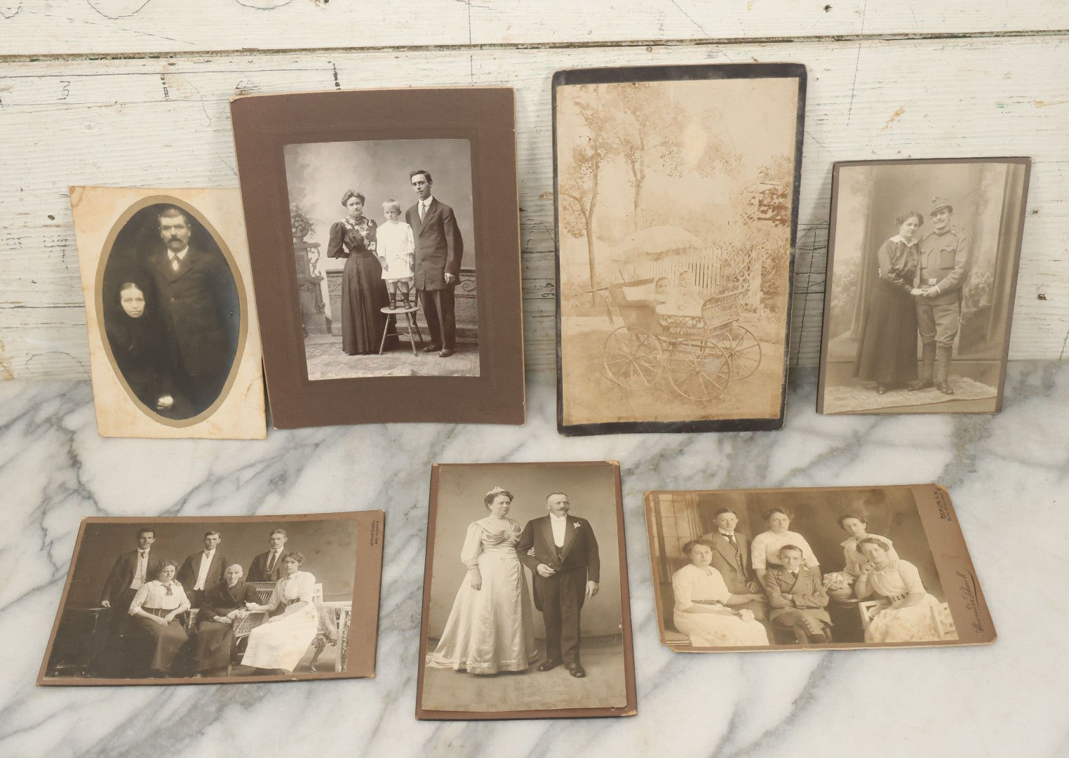 Lot 097 - Grouping Of Seven Antique Cabinet Card Photographs, Mostly German, Including Children In Pram, Woman In Mourning, Etc., Photographers Out Of Berlin 