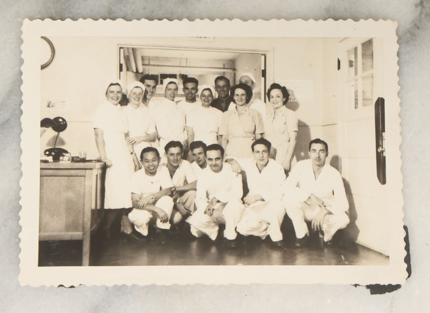 Lot 098 - Grouping Of Seven Vintage Snap Shot Photographs Including Child With Baby Deer Fawn, Man With Pelts, Teepee Campsite, Burned Boat, Etc.