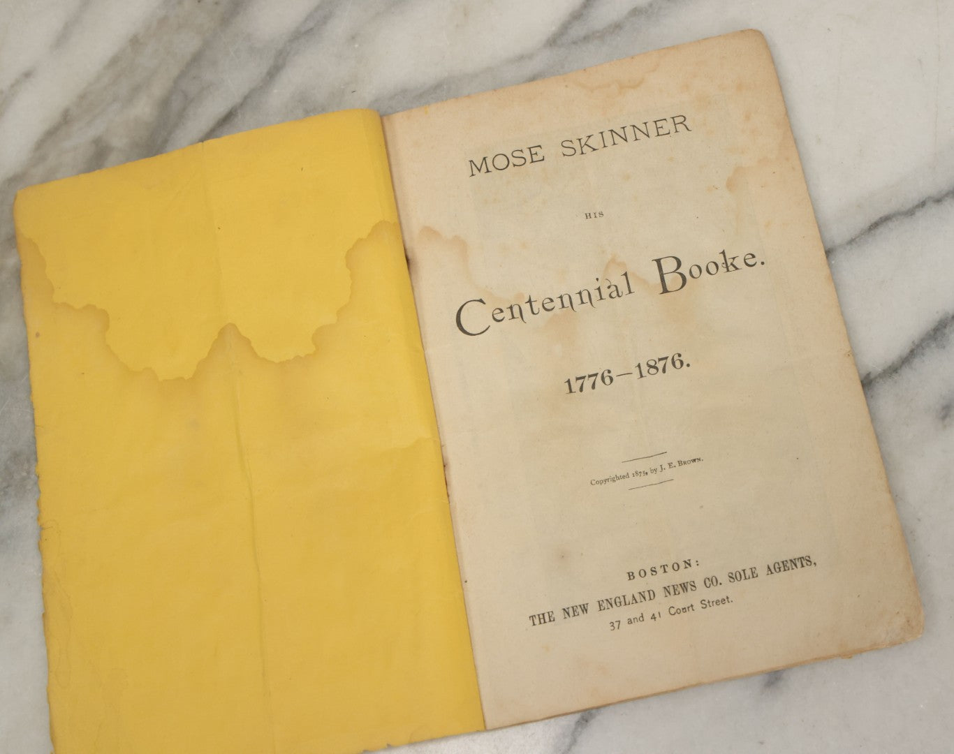 Lot 102 - "Mos Skinner's Centennial Book 1776-1876" Antique Comic Illustrated Booklet, Published By New England News Company, Printed By Warren Richardson, Boston, Copyrighted 1875 By J.E. Brown
