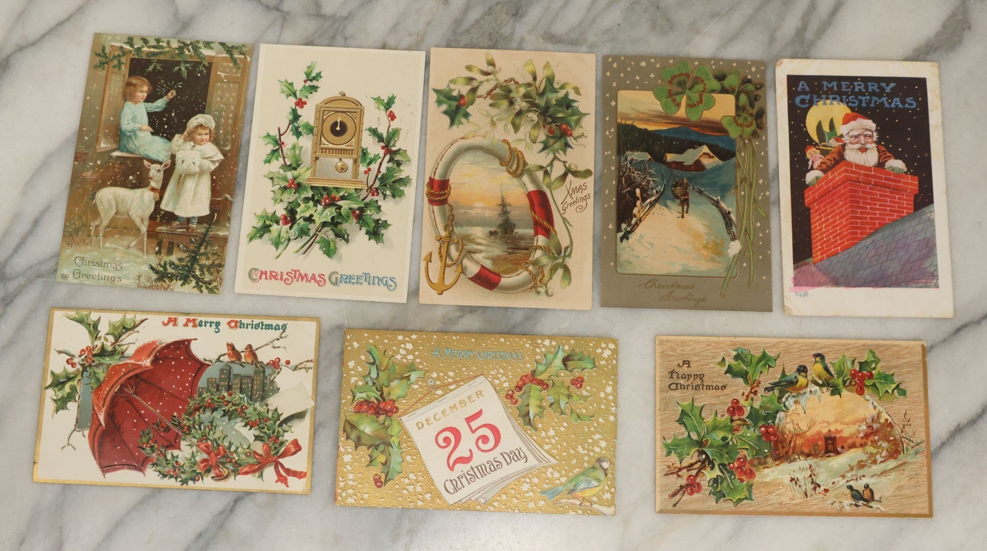 Lot 115 - Grouping Of Eight Antique And Vintage Christmas Postcards Including White Lamb, Nautical Theme, And Santa