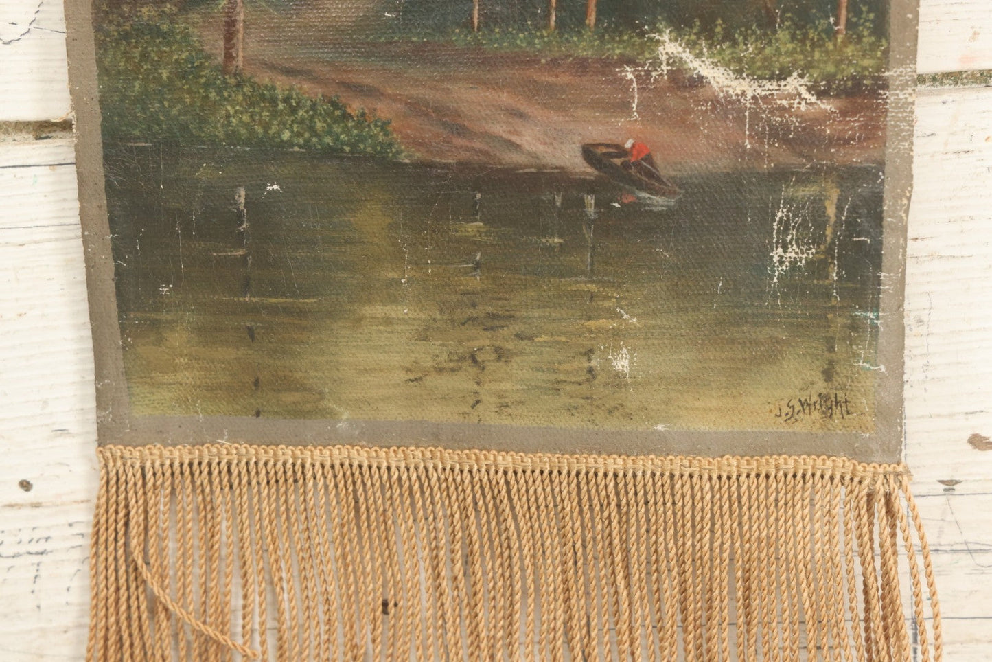 Lot 079 - Antique Oil On Canvas Hanging Painting Of A Rowboat On The Shore Of A Forest, Artist Signed J.S. Wright, With Hanging Rope And Rope Fringe On Bottom