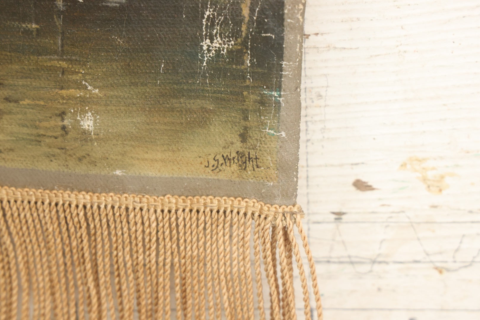 Lot 079 - Antique Oil On Canvas Hanging Painting Of A Rowboat On The Shore Of A Forest, Artist Signed J.S. Wright, With Hanging Rope And Rope Fringe On Bottom