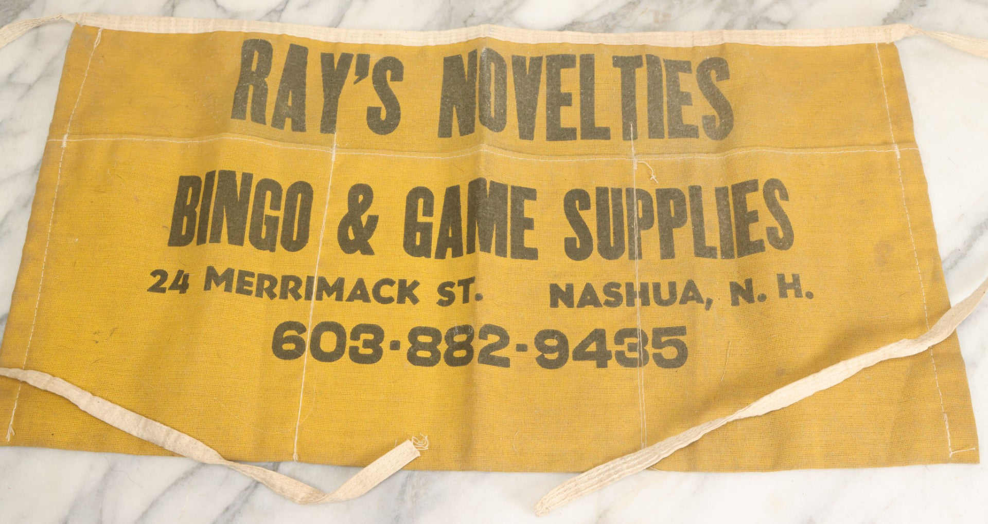 Lot 080 - Vintage Ray's Novelties Bingo And Game Supplies Cashier Salesman's Apron, Nashua, New Hampshire