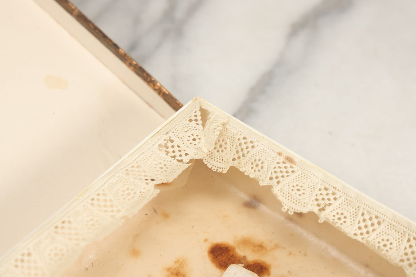 Lot 085 - Antique Paper Board Candy Box With Tufted Red Fabric, Blue Boy With Flowers Graphic On Cover