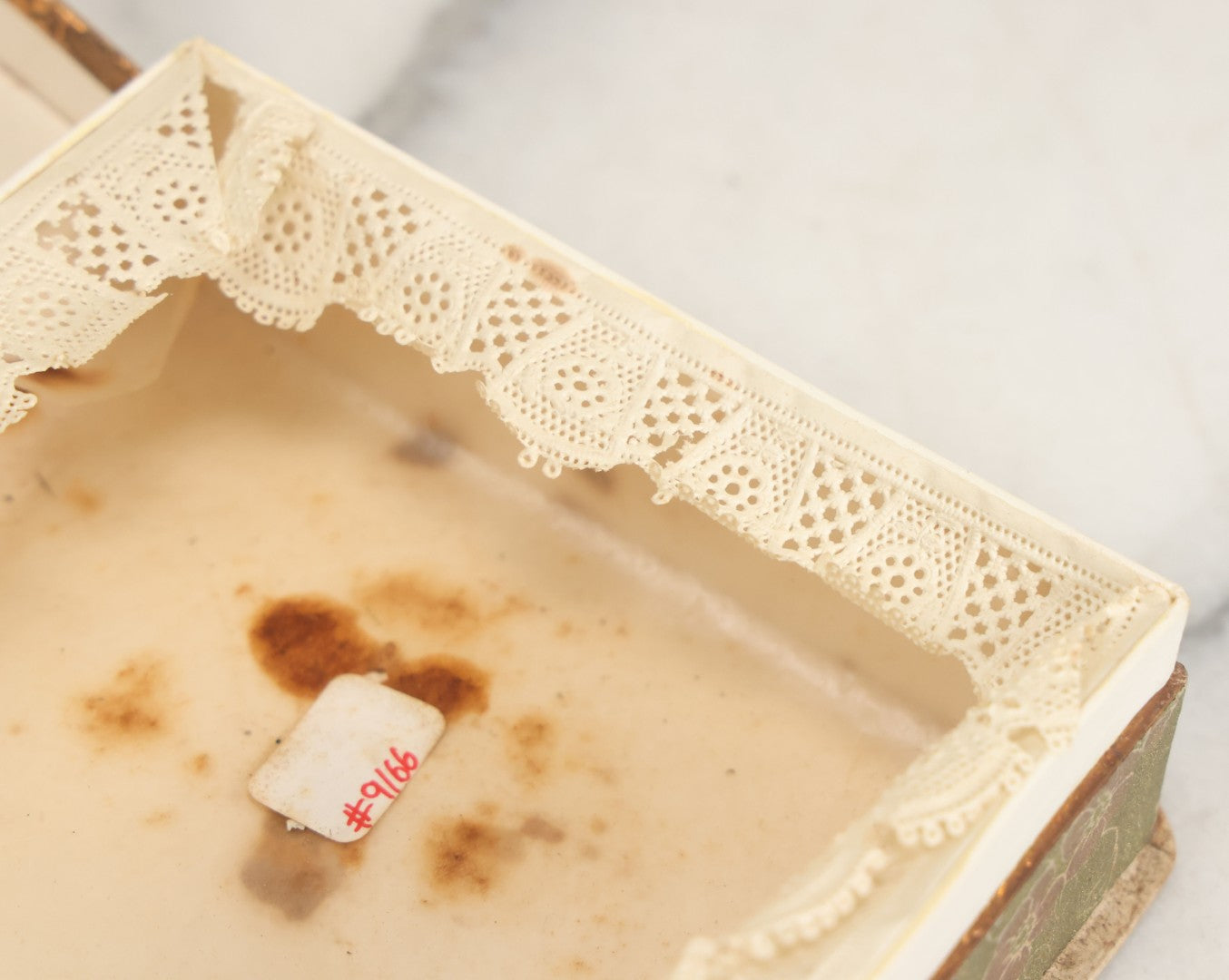 Lot 085 - Antique Paper Board Candy Box With Tufted Red Fabric, Blue Boy With Flowers Graphic On Cover