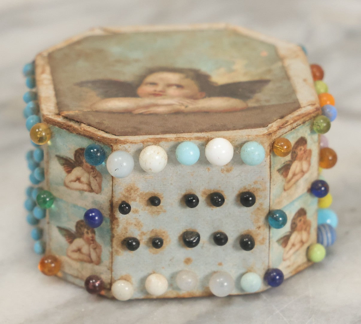 Lot 087 - Pair Of Antique Paper Board Pin Cubes, Including H.F. Neuss "Original Pin Cube" With Paper Label On Bottom, With Various Ball Head Sewing Pins 