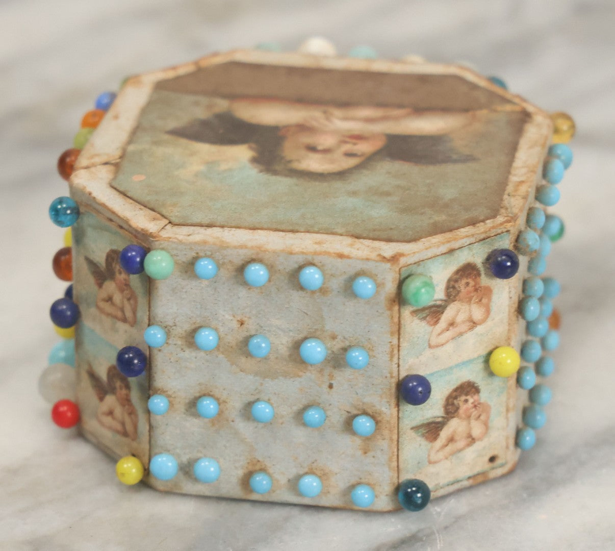 Lot 087 - Pair Of Antique Paper Board Pin Cubes, Including H.F. Neuss "Original Pin Cube" With Paper Label On Bottom, With Various Ball Head Sewing Pins 