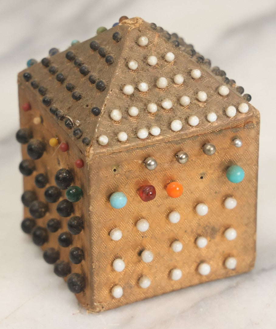 Lot 087 - Pair Of Antique Paper Board Pin Cubes, Including H.F. Neuss "Original Pin Cube" With Paper Label On Bottom, With Various Ball Head Sewing Pins 