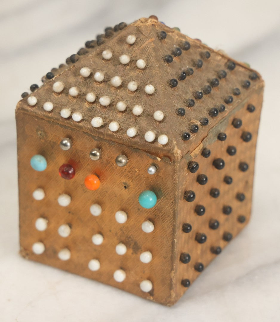 Lot 087 - Pair Of Antique Paper Board Pin Cubes, Including H.F. Neuss "Original Pin Cube" With Paper Label On Bottom, With Various Ball Head Sewing Pins 