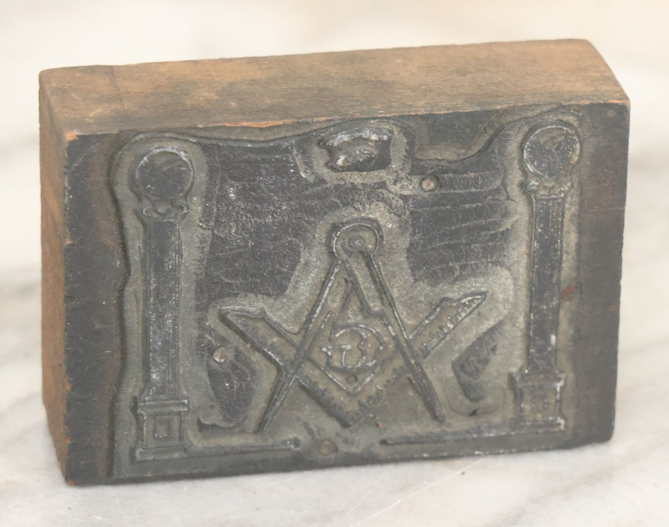 Lot 089 - Grouping Of Four Vintage Printing Blocks Including Masonic, Knights Of Columbus, Strange Hollering Man, And Tom Field Associates