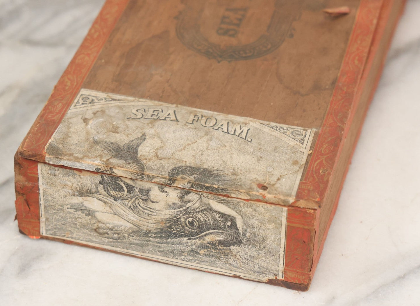 Lot 094 - Antique Wooden Cigar Box With Lithographed Label For Seafoam Cigars, Hampden Cigar Co., Manufacturers, With Nude Woman On Dolphin Graphics On External And Internal Labels, Note Cover Detached