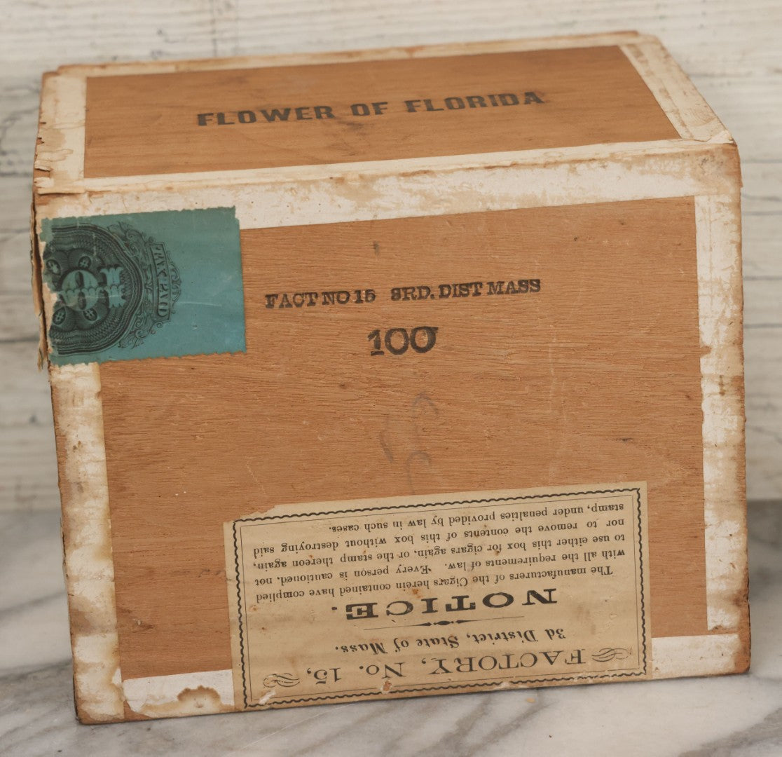 Lot 097 - Antique Wooden Cigar Box With Lithographed Label For Flower Of Florida Cigars, With Woman In Pink Hat & Lighthouse Graphics On External And Internal Labels, Paper Label From Milliken Tomlinson Company, Portland, Maine