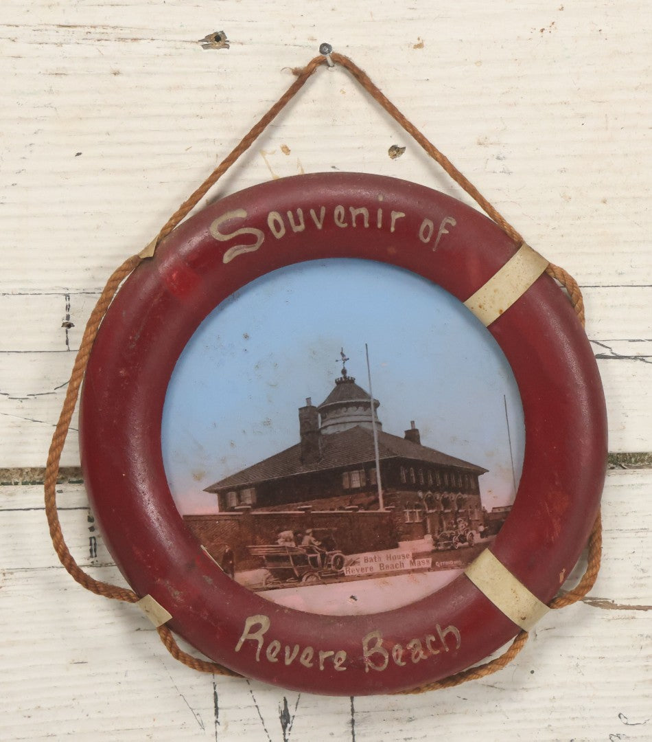 Lot 101 - Antique Souvenir Of Revere Beach, Massachusetts, With Photo Of Bath House And Automobile, In Hand Painted Life Preserver Frame With Rope Embellishments