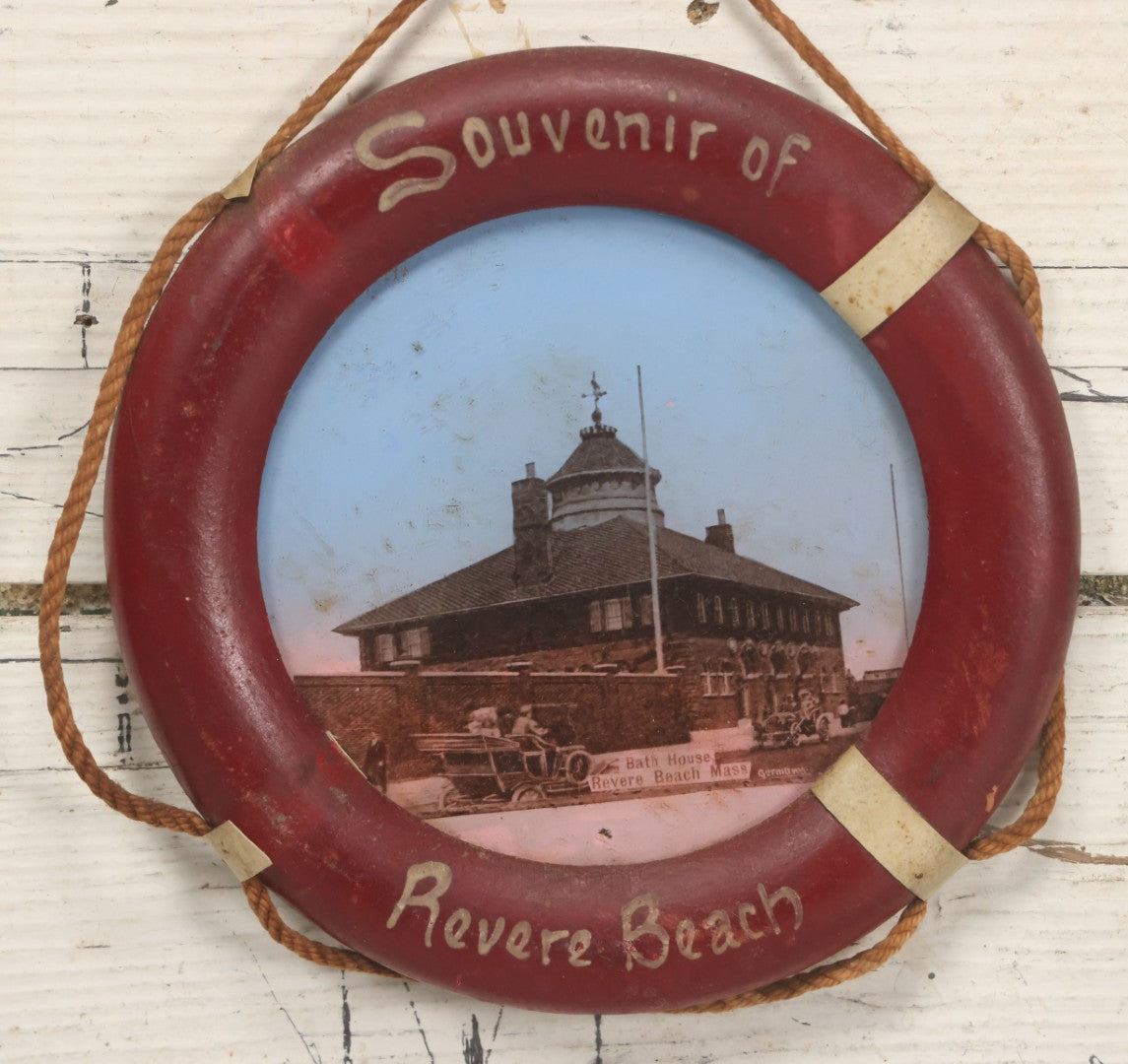 Lot 101 - Antique Souvenir Of Revere Beach, Massachusetts, With Photo Of Bath House And Automobile, In Hand Painted Life Preserver Frame With Rope Embellishments