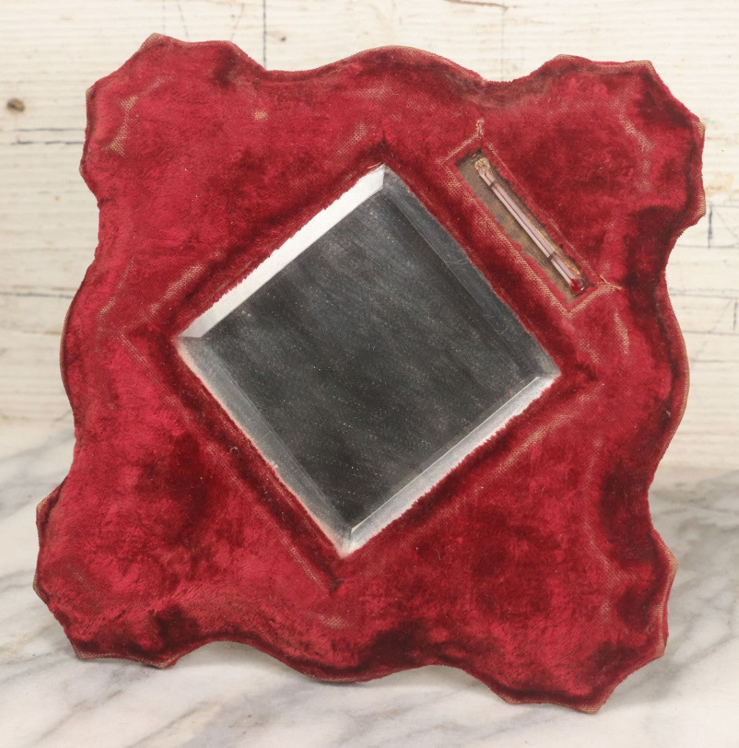 Lot 104 - Antique Beveled Dresser Mirror With Red Velvet Surround And Thermometer, Pressboard Backing, And Wire Kick Stand