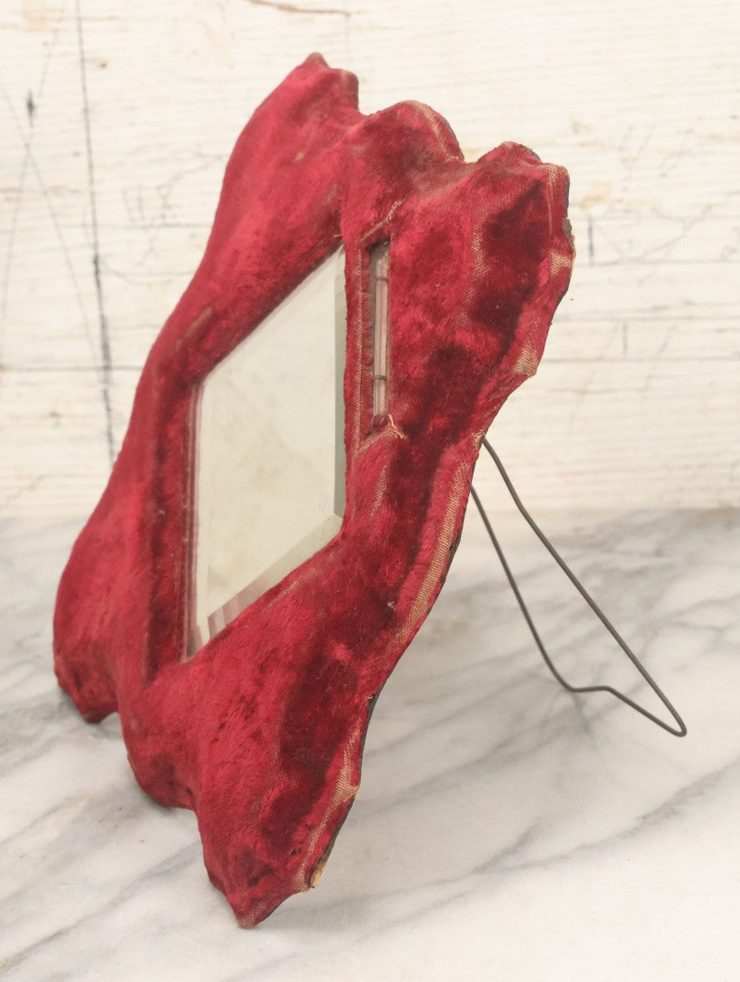 Lot 104 - Antique Beveled Dresser Mirror With Red Velvet Surround And Thermometer, Pressboard Backing, And Wire Kick Stand