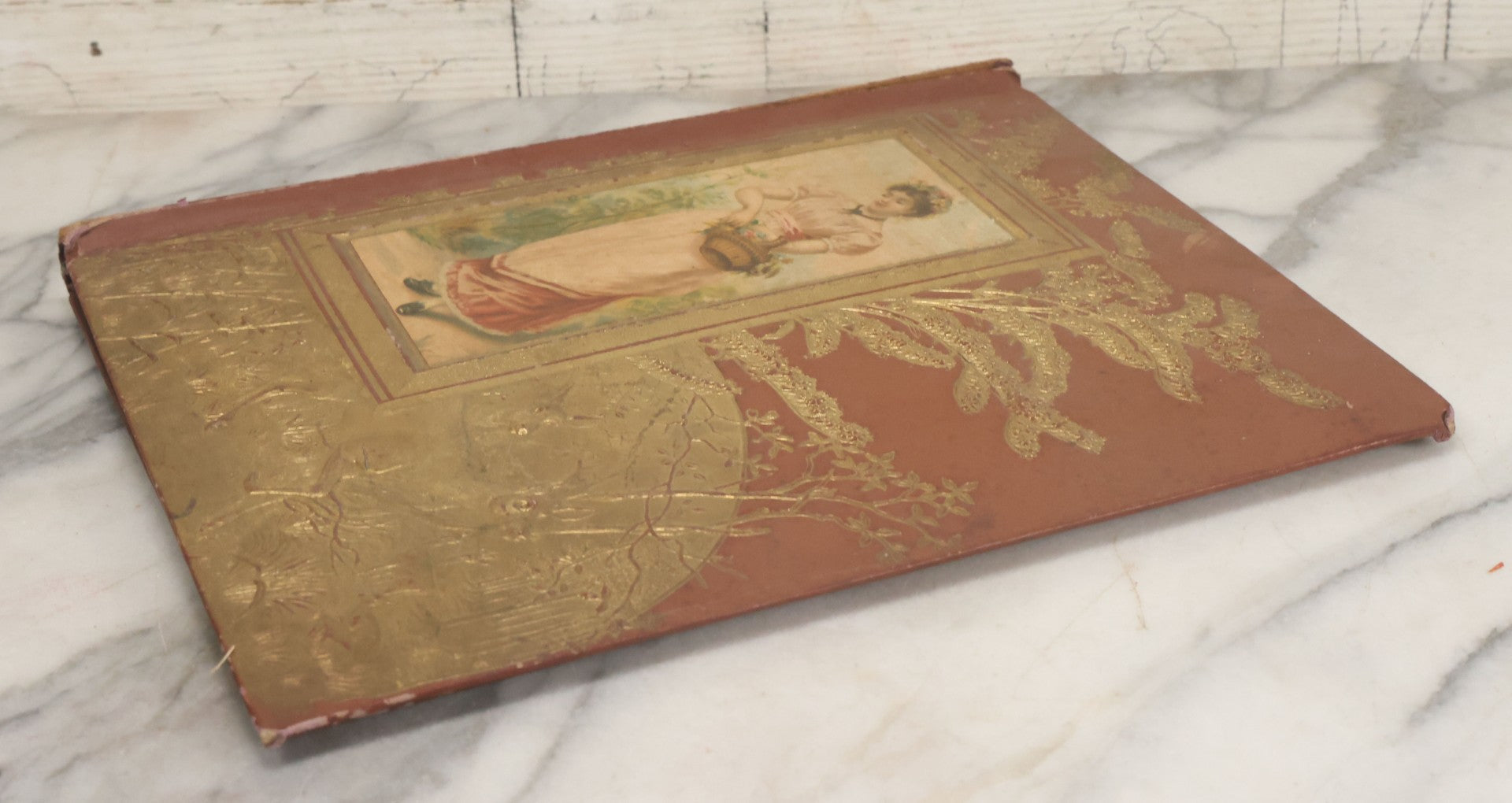 Lot 105 - Empty Antique Victorian Scrapbook With Embossed Cover With Gold Paint And Roe Deer, Lithograph Of Woman With Flower Basket, Belonged To Bessie Gooch, No Contents, As Found