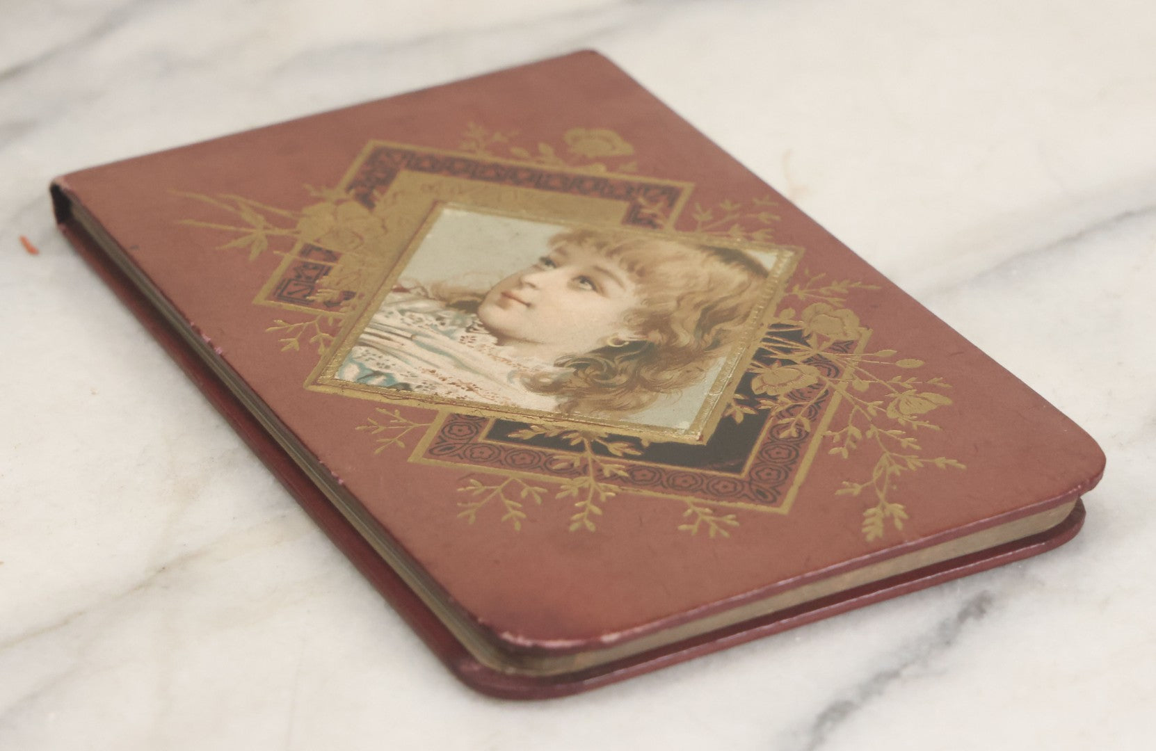Lot 106 - Empty Antique Victorian Autograph Album, "The Hendschel Album" Published By The Major Knapp & Co., New York, With Little Girl On Cover, Gold Flowers, Seven Full Page Chromolithograph Plate Inserts