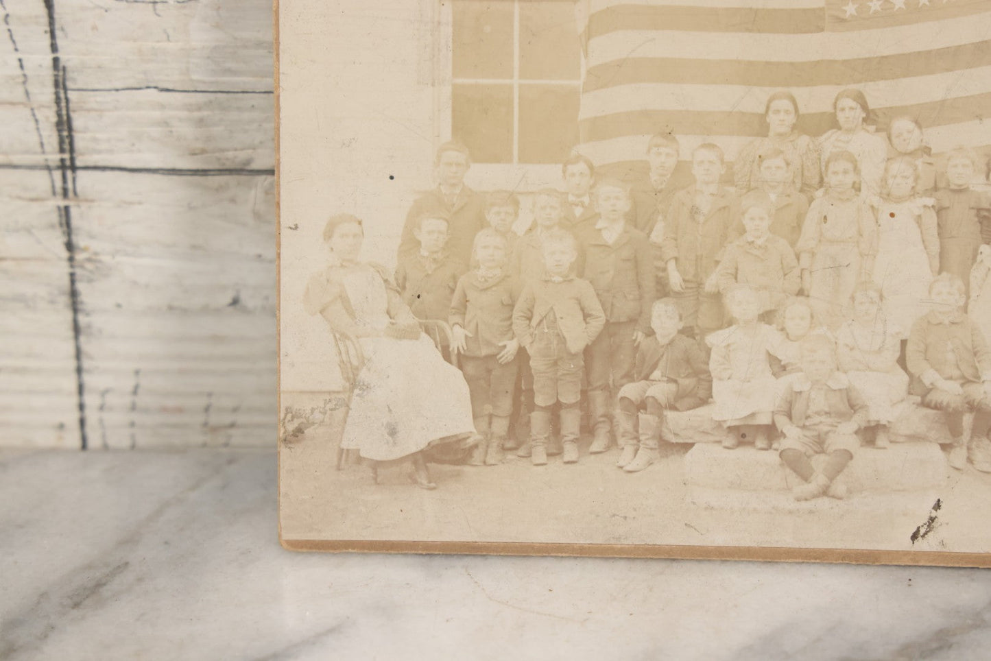 Lot 112 - Antique Boarded Photograph Of Western Pennsylvania School Class Posing In Front Of 44 Star American Flag With Teachers, Lenning & Thompson, Photographers, Martinsburg, Pennsylvania